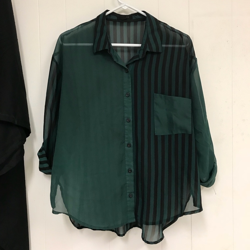 Sheer green and black stripe patterned blouse.